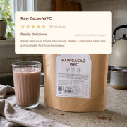 Raw Cacao WPC customer review above a chocolate protein shake and product pouch